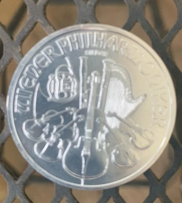 2022 AUSTRIAN PHILHARMONIC  1  OZ. FINE SILVER BULLION 999 BU-UNC 1,50 EURO COIN - Image 1 of 4