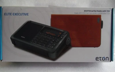 Radio satélite Eton Elite Executive AM FM onda corta banda de avión y estuche NUEVO Foto 1 de 2