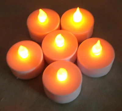 Nuevo paquete de 6 AMBER luces parpadeantes sin llama LED Tealight vela de té sin calor Foto 1 de 3