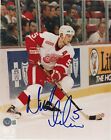 NICKLAS LIDSTROM Signed RED WINGS 8x10 PHOTO Beckett Authenticated (BAS)
