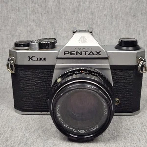 Pentax K1000 fotocamera reflex pellicola 35 mm con obiettivo 50 mm - Foto 1 di 12