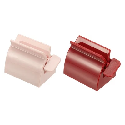 Toothpaste Tube Squeezer, 2Pcs 2.3" Toothpaste Squeezer Rollers, Red/Pink - Image 1 of 4