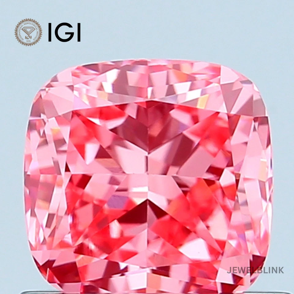 IGI Certified 0.78 Carat Fancy Vivid Pink VVS2 Cushion Cut CVD Lab Grown Diamond - Image 1 of 4
