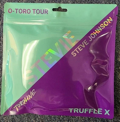 Juego de cuerdas de tenis híbrido Toroline Stevie como nuevo/púrpura Foto 1 de 2