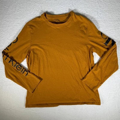 CALVIN KLEIN Men's Long Sleeve Gold Sun/Black Letters T-Shirt L - Image 1 of 4