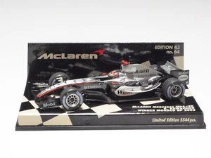 MINICHAMPS 1:43 MCLAREN MERCEDES MP4-20 K. RAIKKONEN MONACO GP 2005 #64 "West" - Foto 1 di 5