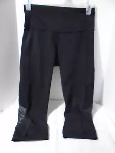 LULULEMON CROPPED BLACK LEGGINGS SIZE 4 MESH INSERT AT BOTTOM - Picture 1 of 5
