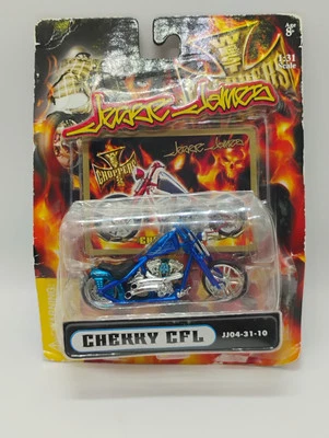 Muscle Machines 1:31 Scale Jesse James West Coast Choppers Blue Cherry CFL - Image 1 of 4