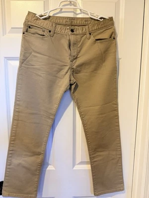 Pantalones de mezclilla de viaje Banana Republic para hombre 33x30 calce ajustado pantalón de viajero color caqui tostado oficina Foto 1 de 4