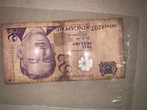Singapore $2 0QS928207 - Picture 1 of 2