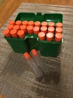 Green Ammo Box w/ 22 Blackhorn 209 Black Powder Charge Tubes
