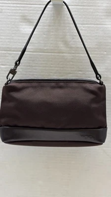 Bolso de mano Tumi marrón de cuero balístico para teléfono celular pequeño 9" x 5,5" x 1,75" Foto 1 de 4