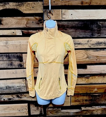 Lululemon women’s Run Reflect Pullover In  Burning Yellow size 4 - Image 1 of 4