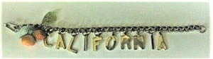 VINTAGE 1940'S CALIFORNIA ORANGES GOLD - GLASS SOUVENIR BRACELET - CALIFORNIA - Picture 1 of 4