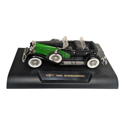 Signature 1934 Duesenberg Diecast Car 1:32  6" Long On Stand Green and Black - Image 1 of 4