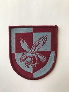 16TH AIR ASSAULT FORMATION ARM BADGE - MAROON ON BLUE ISSUE - NEW