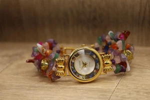 Vintage Lucoral Damenuhr Gold konvex Kristall Vogel Edelstein Perlen neue Fledermaus 7" - Bild 1 von 6