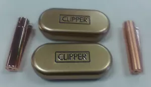 DUE CLIPPER METALLO ORO ROSA ACCENDINO UNO LUCIDO UNO OPACO CON CUSTODIA IN METALLO - Foto 1 di 4