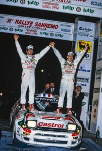 Didier Auriol and Bernard Occelli celebrate victory Rally Sanremo - Old Photo - Picture 1 of 1