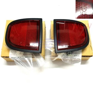 PAIR REAR REFLECTOR MITSUBISHI L200 2006 -2012 GENUINE RH LH RIGHT LEFT OS NS - Picture 1 of 3