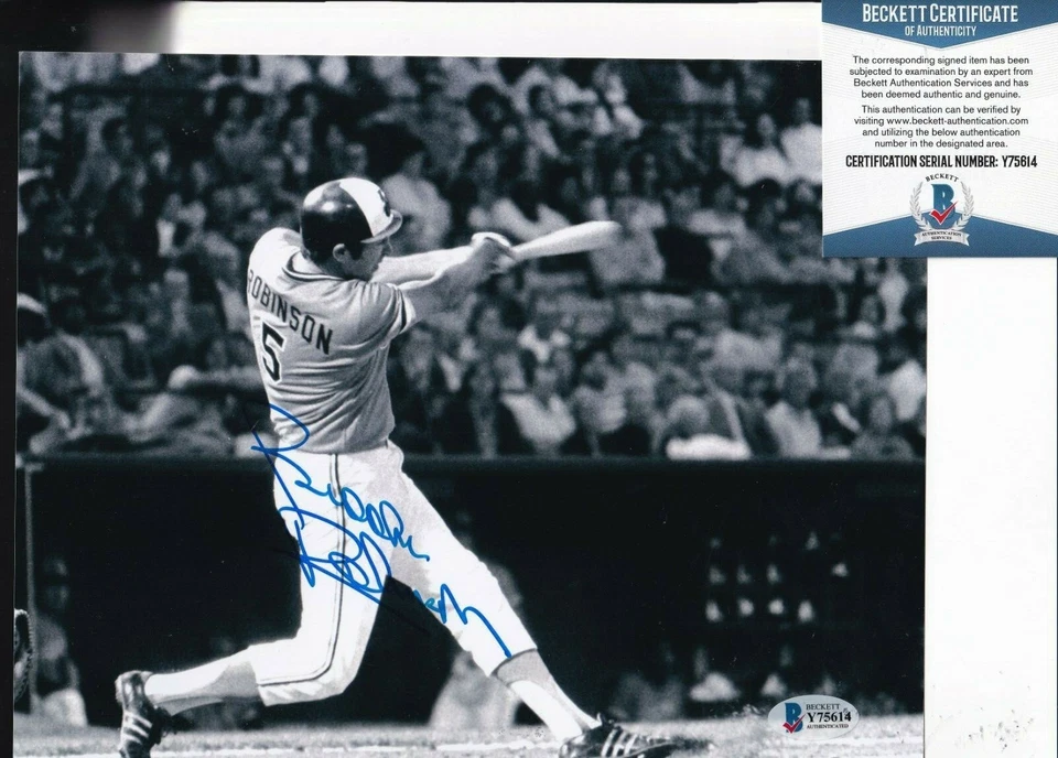 BROOKS ROBINSON signed (BALTIMORE ORIOLES) baseball 8X10 photo BECKETT Y75614 - Image 1 of 1
