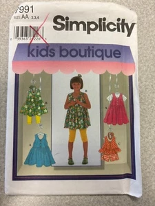 Simplicity 7991 GIRLS DRESS TUNIC TOP SHORTS HEADBAND KNIT LEGGINGS Sz 2-4 NEW - Picture 1 of 2