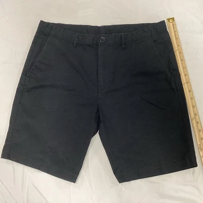 Pantalones cortos chinos ajustados negros Calvin Klein para hombre talla 34 Foto 1 de 4