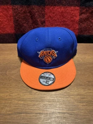 Sombrero ajustable My 1st 9FIFTY azul/naranja New York Knicks New Era para bebés pequeños Foto 1 de 4