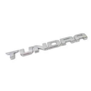Placa de identificación trasera derecha OEM 2014-2024 Toyota Tundra emblema 75471-0C0140 - Imagen 1 de 5