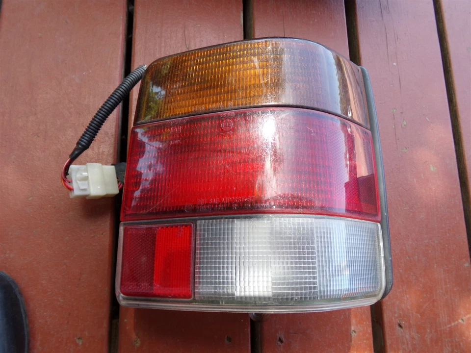 1991 Subaru Justy Tail Light RH OEM IKI 4447 1989 90 91 92 93 94 95 - Image 1 of 4