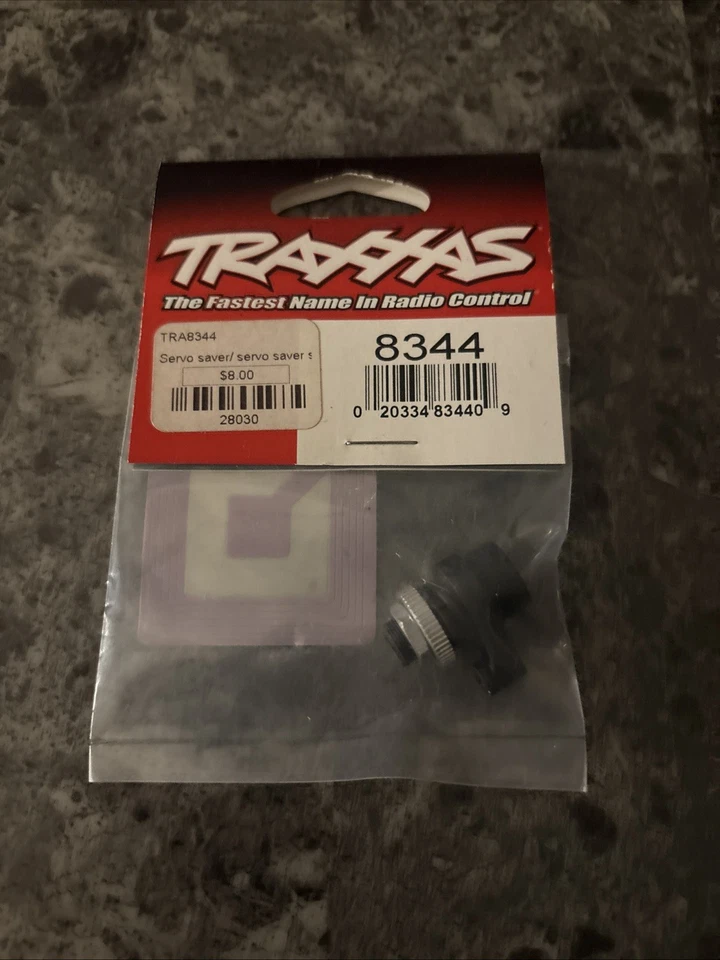 (B2) Traxxas 8344 4-Tec 2.0 Servo Saver, Spring & Horn Ford GT Mustang XL-5 VXL - Image 1 of 1
