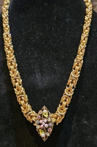 Großer Knoten goldfarbene Halskette mit Kristall und Kunstperlen Plättchen Blumen Anhänger... - Bild 1 von 3