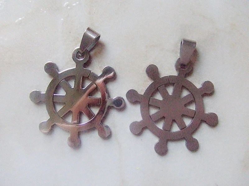 1pz charm ciondolo TIMONE in acciaio inox  36x24mm colore argento scuro - Immagine 1 di 1