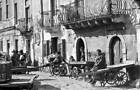 Sicilian men relaxing sitting on barrows Sicily March 1958 Old Photo