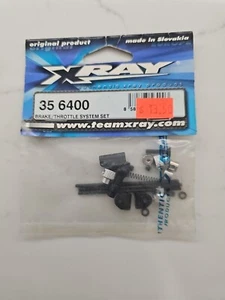 XRAY 35 6400 EXHAUST WIRE MOUNT SET NEW - Picture 1 of 1