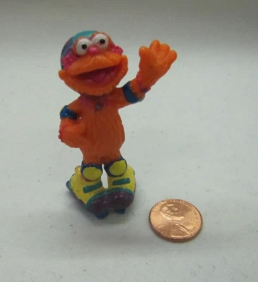 芝麻街佐伊怪物滑冰 PVC 公仔泰科蛋糕装饰玩具 2.5" 1997 — 第 1/3 张图片