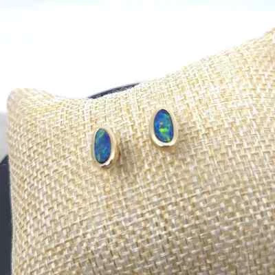 Pendientes de ópalo de roca doble natural australiano de oro macizo de 14 k 6,3 x 10,7 mm Foto 1 de 4