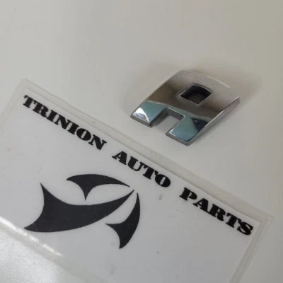 2004-2009 Mitsubishi Endeavor Rear Emblem Letter E Only OEM NO ADHESIVE - Image 1 of 3