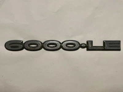 VINTAGE PONTIAC 6000 LE 82-91 REAR TRUNK EMBLEM BADGE LOGO GENUINE OEM USED — 第 1/4 张图片