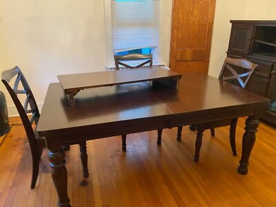 Butcher block dining room table. Dark wood. Slightly used - Image 1 of 2