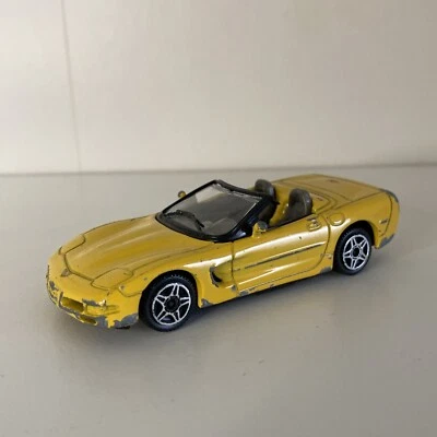 Burago Chevrolet Corvette Jaune 1/43 Métal Voiture Miniature  - Photo 1/4