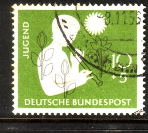 GERMANY....  1956  10pf + 5pf girl playing flute and flowers  used - Picture 1 of 1