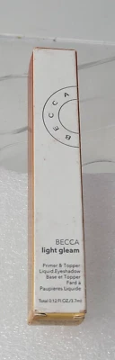 BECCA Light Gleam Primer & Topper Liquid Eyeshadow .12 fl oz red star - Image 1 of 4