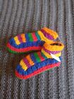 Hand knitted multicolour baby booties . Polar fleece lined.