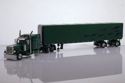 DCP Peterbilt 359 GREEN Midroof Sleeper Cab w/Roll-Tarp Spread-Axle Trailer 1:64 - Image 1 of 4