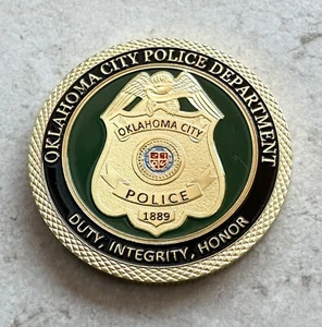 Moneta sfida dipartimento polizia Oklahoma City - Foto 1 di 2