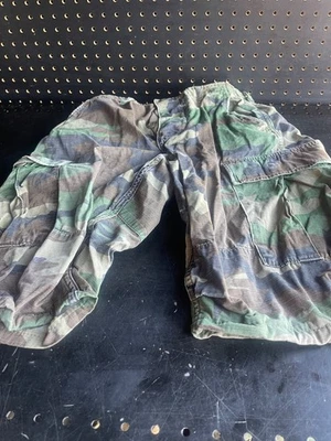 Used Vietnam pants made into shorts. Small  Woodland Camo Rip-Stop BDU Shorts - Image 1 of 4