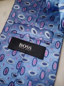 Corbata de vestir para hombre Hugo Boss Made Italy azul seda con diseños multicolores - Imagen 1 de 7