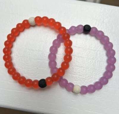 Juego de 2 pulseras estilo brazalete Lokai de silicona con cuentas naranja y púrpura de 6 pulgadas Foto 1 de 4