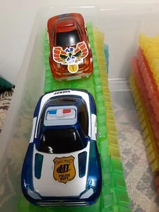MAGIC TRACKS 2 SETS OF TRACKS AND 2 CARS PRE OWNED - Picture 1 of 3
